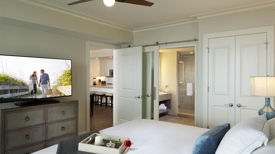 Master bedroom with TV at Ocean Oak Resort, a Hilton Grand Vacations Club located at Hilton Head, South Carolina.