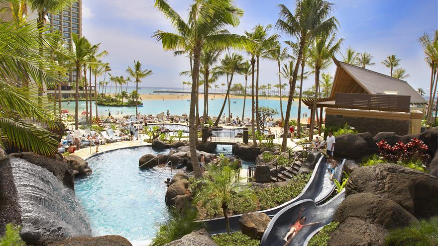 Pool and waterslide at Lagoon Tower, a Hilton Grand Vacations Club at Oahu, Hawaii.