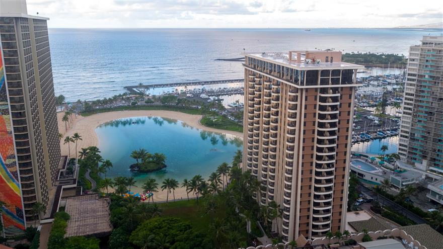 Aerial view of Lagoon Tower, a Hilton Grand Vacations Club and the Pacific Ocean.