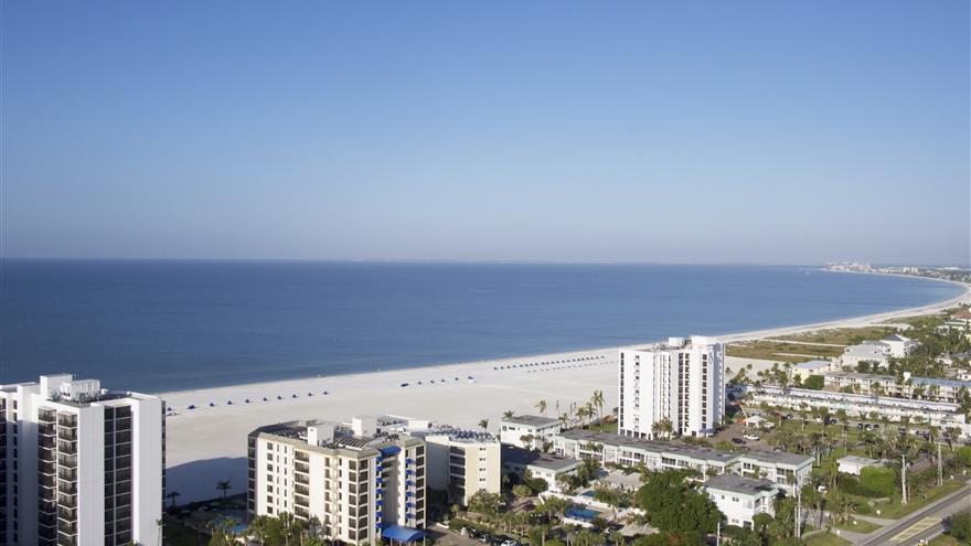 Aerial view of Gulf of Mexico and Seawatch On-the-Beach Resort located at Fort Myers Beach, Florida.
