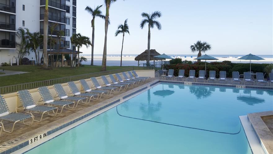 Pool with a view of the Gulf at Seawatch On-the-Beach Resort located at Fort Myers Beach, Florida.