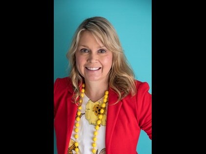 Head shot of Morgan Rahimi, MS, LMFT, PMH-C. 