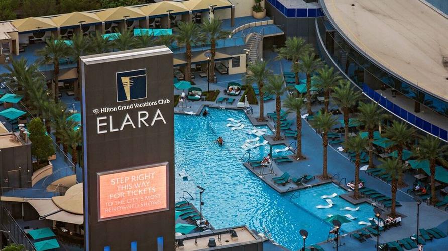Elara by Hilton Grand Vacations sign and pool in Las Vegas. 