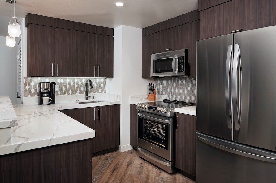 A Fully equipped kitchen in a Hilton Grand Vacations Suite. 