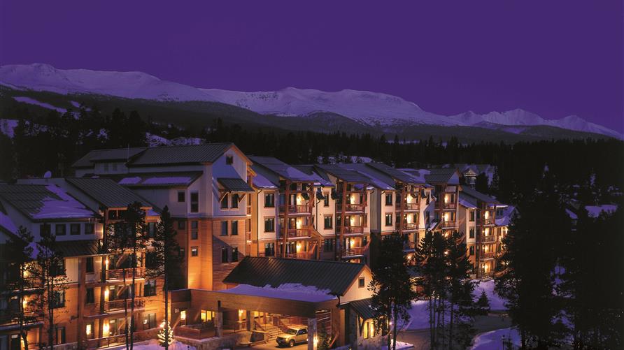 Nighttime aerial view of Hilton Grand Vacations Valdoro Mountain Lodge in Breckenridge, Colorado. 