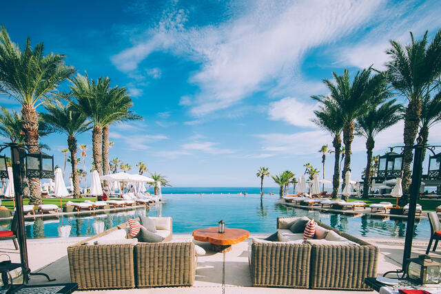 Stunning view of the infinity pool at the Hilton Los Cabos Beach & Golf Resort.