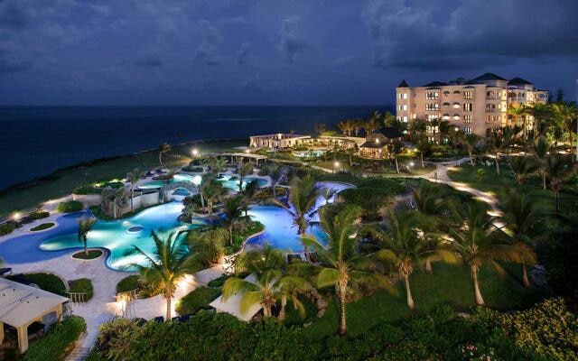 Aerial nighttime view of Hilton Grand Vacations at The Crane in Barbados. 