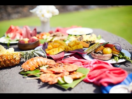 Spread of regional Hawaiian foods in the grill area at Hilton Waikoloa Village on the Big Island of Hawaii. 