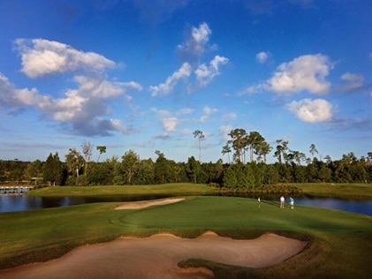Panoramic shot of two men on a golf course in Orlando, Florida. 