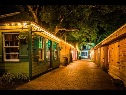 Alley way lighting the night sky in St. Augustine, Florida. 
