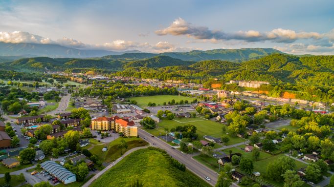 Beautiful aerial shot of quaint mountain nestled in verdant foot hills, Pigeon Forge, Tennessee. 