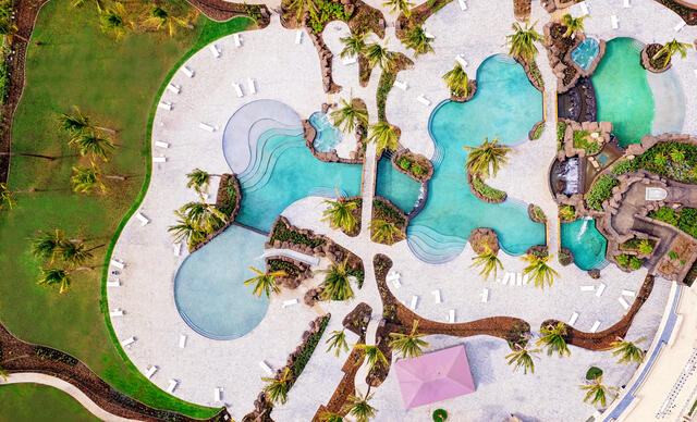 Stunning aerial shot of super pool complex at Maui Bay Villas, a Hilton Grand Vacations Club, Hawaii. 