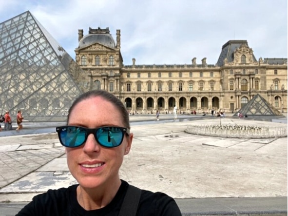 Hilton Grand Vacations Owner Erin W. outside of the Louvre in Paris, France