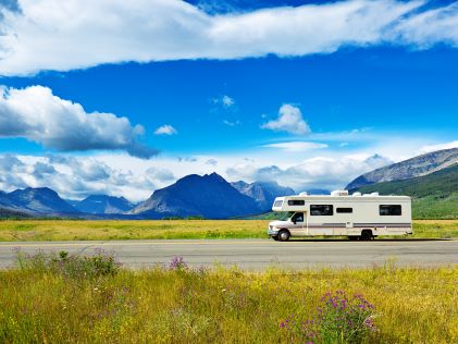 An RV driving near Glacier National Park in Montana