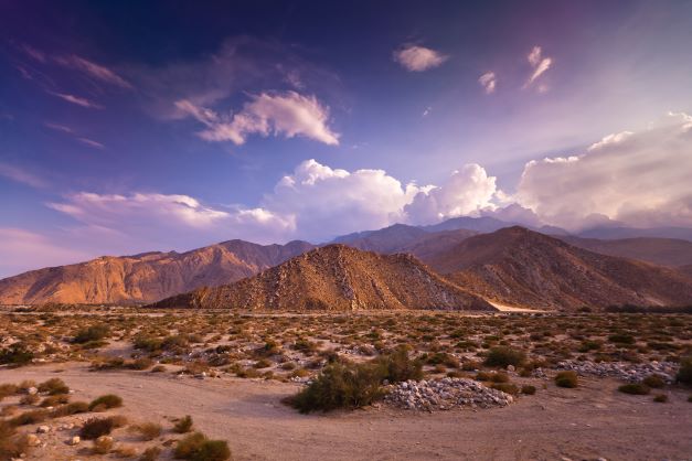 Image, dramatic purple sky over beautiful desert landscape, Palm Desert, California. 