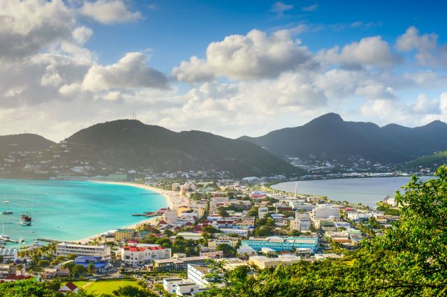 Aerial image, idyllic tropical scene, quaint village, mountains in the distance, Sint Maarten.
