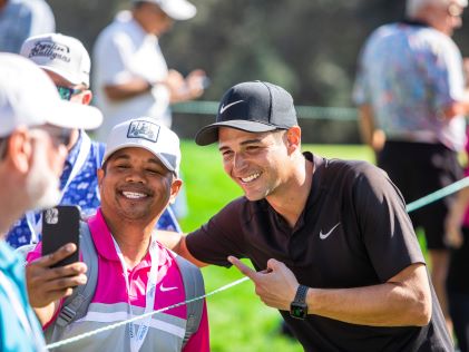 TV personality Wells Adams takes a selfie with an Owner at the 2022 Hilton Grand Vacations Tournament of Champions in Orlando, Florida