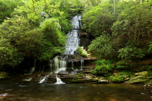 Beautiful multi-tier waterfall set amidst lush green forest, Great Smoky Mountains National Park.