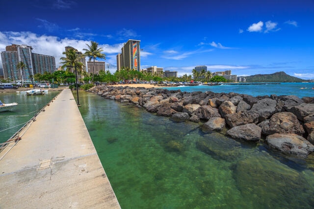 Gorgeous image of Hilton Hawaiian Village from the water's edge, Oahu, Hawaii. 