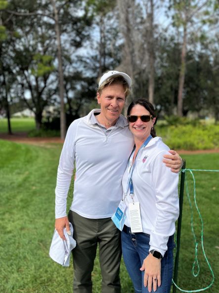 Hilton Grand Vacations Owner happily posing with Jack Wagner on golf course, Hilton Grand Vacations Tournament of Champions, Orlando. 