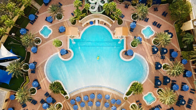 Stunning drone shot of resort-style pool, Parc Soleil, a Hilton Grand Vacations Club, Orlando. 