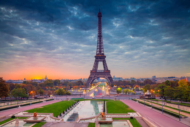 Gorgeous image of the Eiffel Tower, sunset painted skies overhead, Paris, France. 