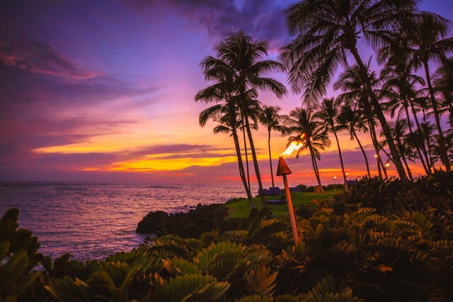 Sunset painted skies over Pacific ocean, Hilton Waikoloa Village®, Big Island, Hawaii. 