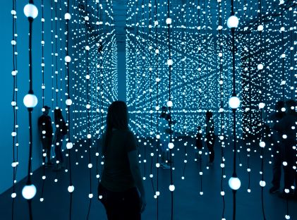 An installation at the Scottsdale Museum of Contemporary Art, strings of lights illuminate a room