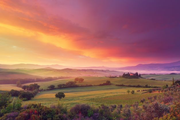Farm in Tuscany, Italy at sunrise