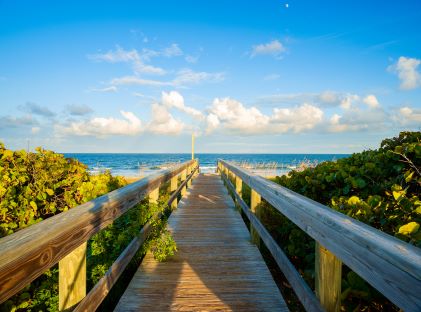 A boardwalk leading up to Cocoa Beach, Florida
