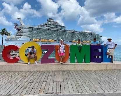 Hilton Grand Vacations Owners posing on Cozumel, Mexico, vacation. 