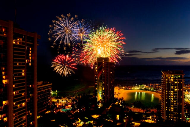 Fireworks bursting beautifully over Hilton Hawaiian Village®, Oahu, Hawaii. 