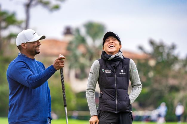 Candid, celebrity and LPGA athlete interaction, laughing on course, 2022 Hilton Grand Vacations Tournament of Champions, Lake Nona Golf & Country Club, Florida. 