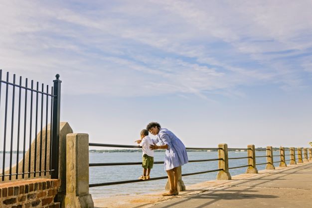 Woman showing young child the harbor, The Battery, Charleston, South Carolina. 