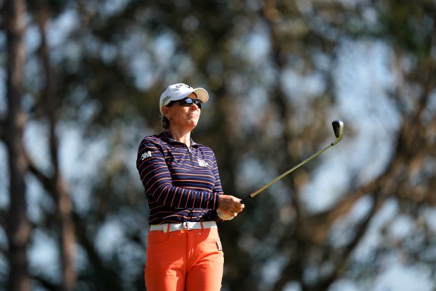 Annika Sorenstam surveys the golf course at the Hilton Grand Vacations Tournament of Champions