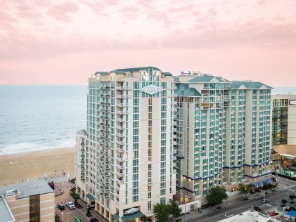 Exterior view of Oceanaire, a Hilton Vacation Club at sunset in Virginia Beach, Virginia