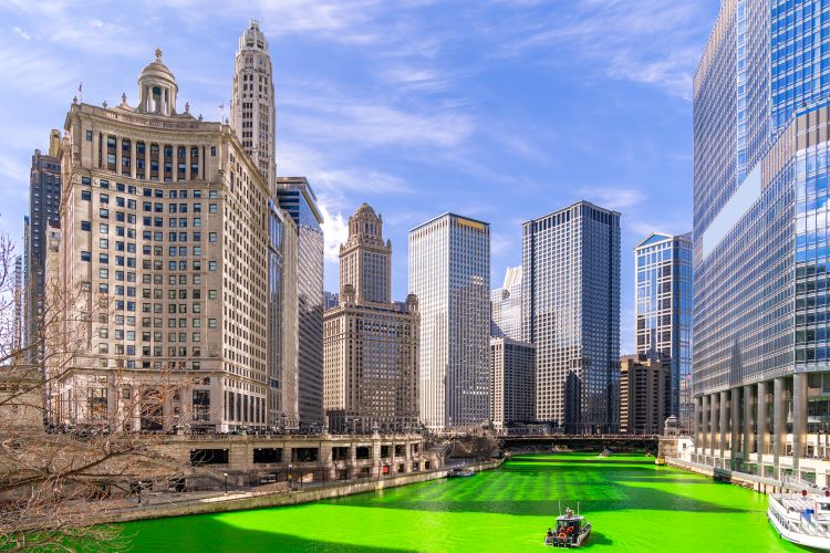 Downtown Chicago skyscrapers along the Chicago River, dyed green as part of the St. Patrick's Day festival