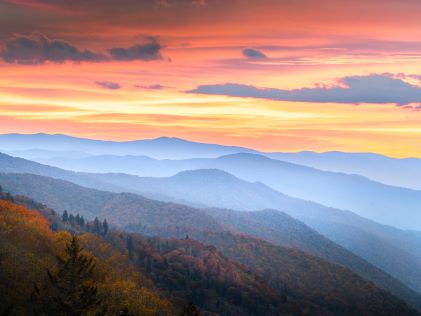 Sunset painted skies, fall foliage, Smokey Mountains, Tennessee. 