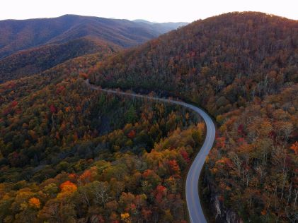 Aerial view, The Blue Ridge Parkway, fall foliage covered mountains, North Carolina. 