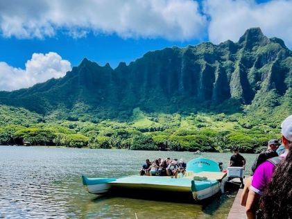 A glass-bottom boat about to embark on a tour of Oahu's waters