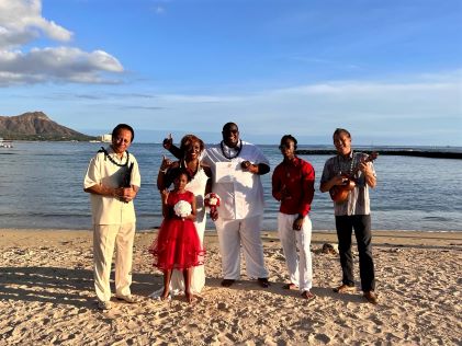 A Hilton Grand Vacations Owner getting married on the beach near The Grand Island, a Hilton Grand Vacations Club in Oahu, Hawaii