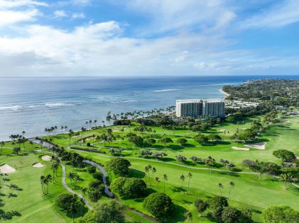 An aerial view of a golf course and Waikiki Beach, Oahu, Hawaii