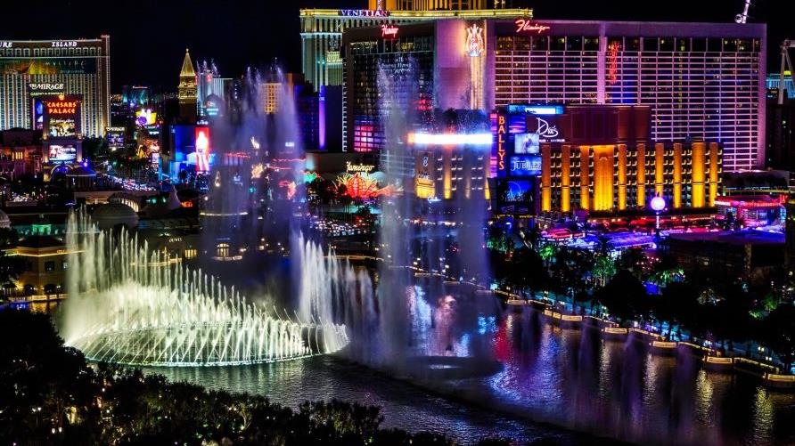 Stunning aerial image, Las Vegas Strip glowing against nighttime sky, Las Vegas, Nevada. 