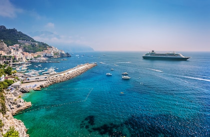 Lovely view of a large cruise ship anchored off the Amalfi coast in Italy