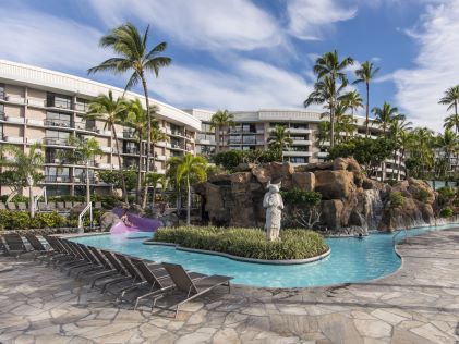 Pool and palm trees at Ocean Tower, a Hilton Grand Vacations Club on Big Island, Hawaii