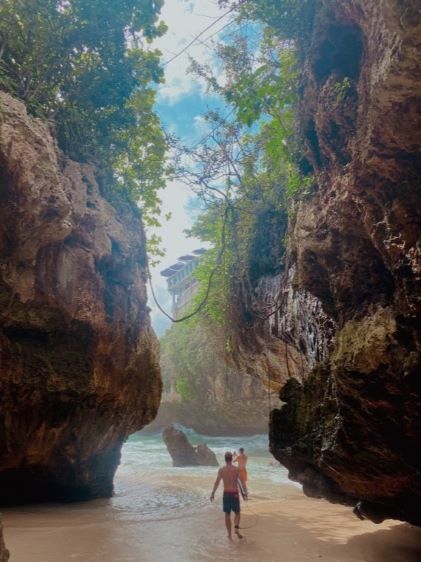 A beach inside a rock formation in Bali, Indonesia