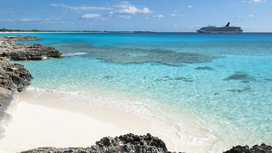Luxury cruise ship drifts off the coast of uninhabited island in Half Moon Cay, Bahamas