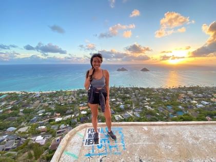 A Hilton Grand Vacations Member on China Walls in Oahu, Hawaii, at sunset