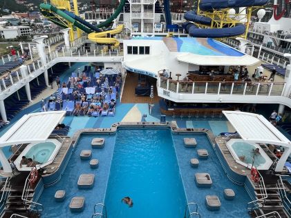 View of a cruise pool, slides and deck, taken by a Hilton Grand Vacations Member
