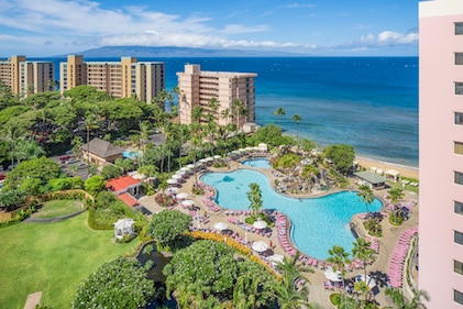 Aerial view of the lush grounds, large pool area and beachfront at Hilton Vacation Club Ka’anapali Beach Lahaina, Hawaii